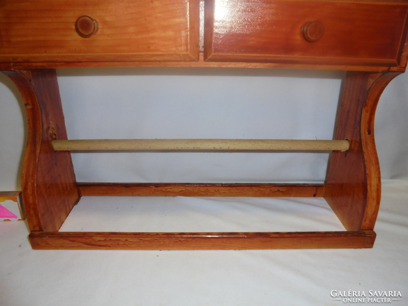 Wall shelf with two drawers, small bowl