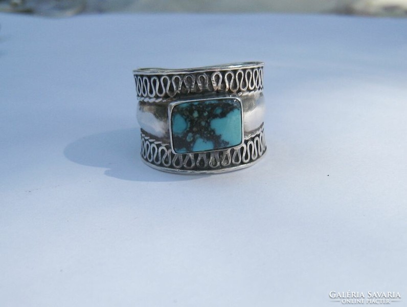 Wide silver ring with turquoise stone