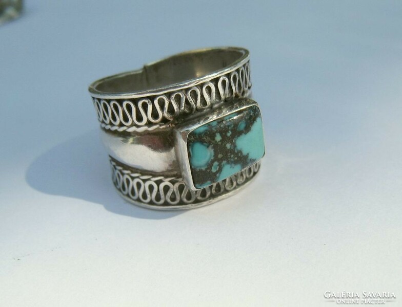 Wide silver ring with turquoise stone