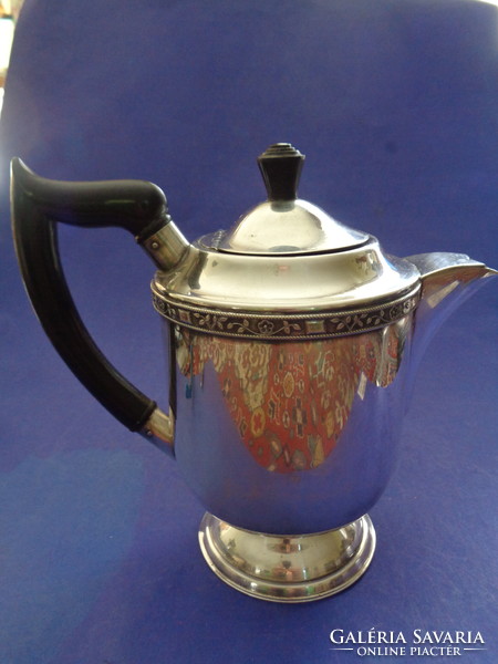 100-year-old silver-plated tea and coffee pot with a classic design