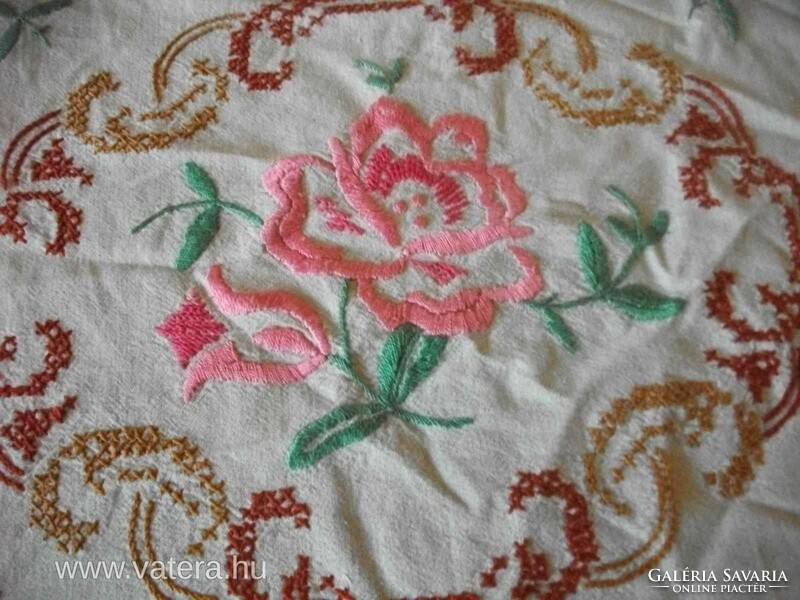 Vintage pink woven cushion cover with cute traditional folk pattern embroidered with multiple stitches
