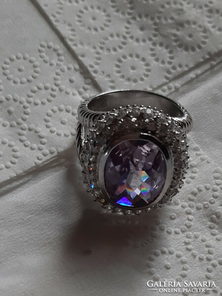 Ring with a polished stone, 925 silver, surrounded by small charms!