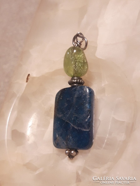 Polished apatite pendant combined with raw aquamarine with silver mounting