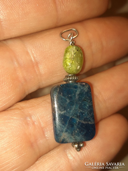 Polished apatite pendant combined with raw aquamarine with silver mounting