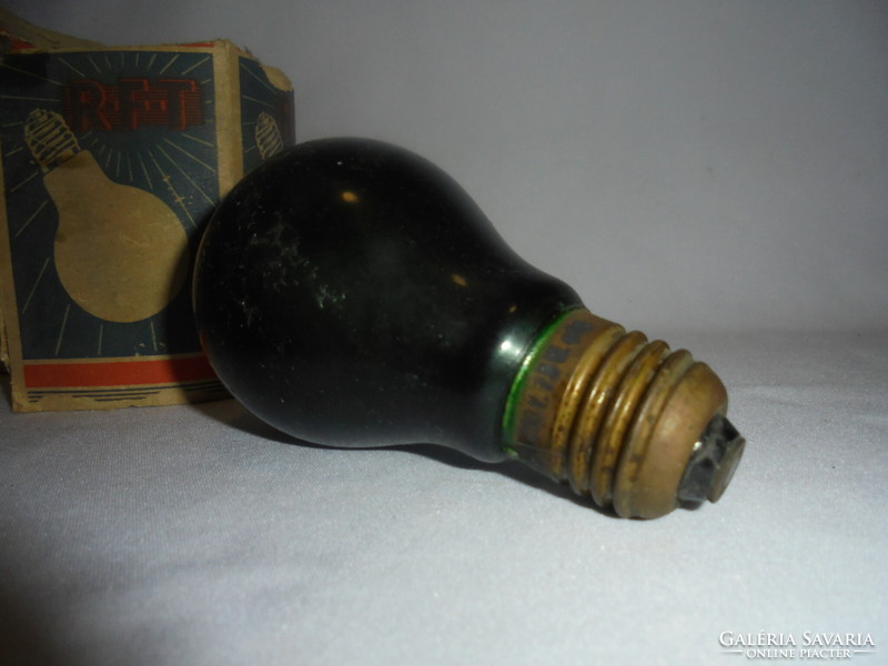 Old dark green light bulb in 