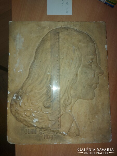 Large, heavy plaster relief, bas-relief, female head