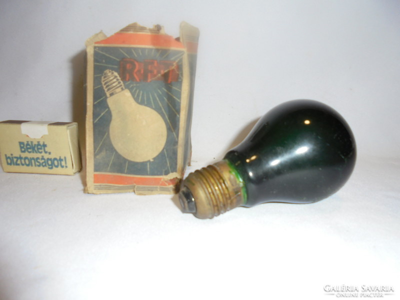 Old dark green light bulb in 