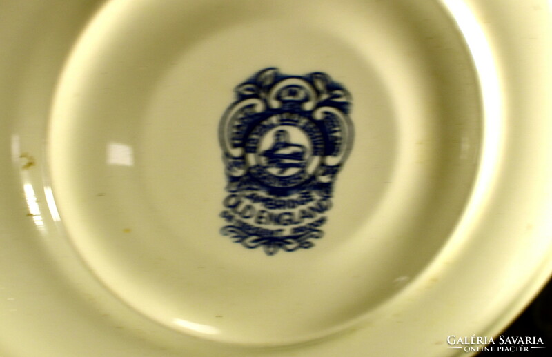 XX. No. The first half is an English faience tea cup