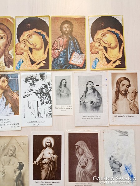 26 images of saints and prayer images in a prayer book from 1918 to the 1980s, together