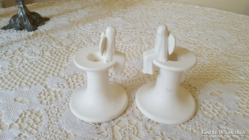 A pair of angelic ceramic candle holders from an old picture gallery