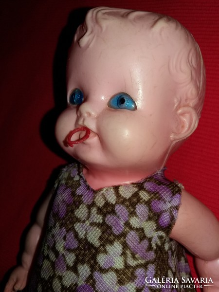 Old traffic goods dmsz plastic toy with baby pacifier in original clothes as shown in the pictures