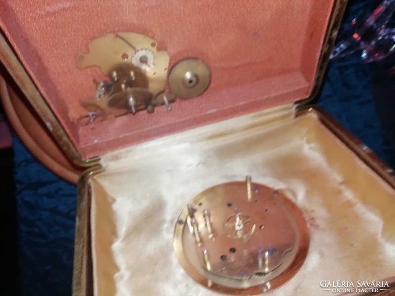 Art deco traveling clock is in the condition shown in the pictures