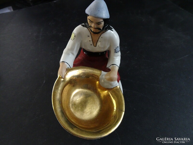 Tatar boy washing gold