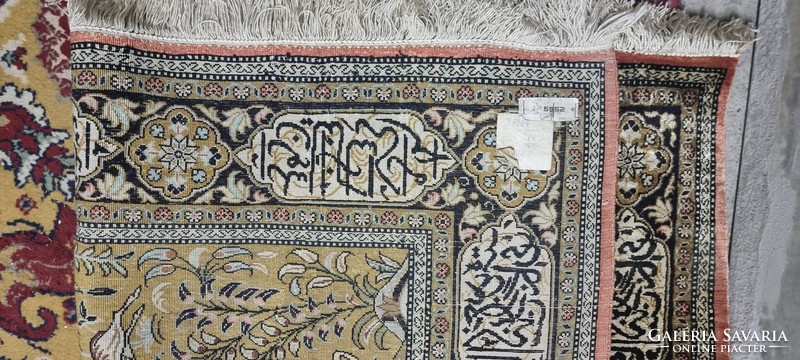 Hand-knotted silk Persian rug