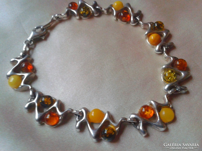 Designer silver bracelet with amber