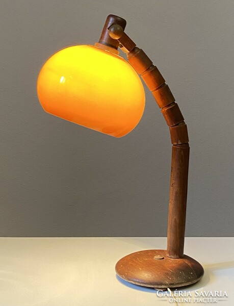 1980 Round retro table lamp with a movable wooden lamp base and a plastic ball shade