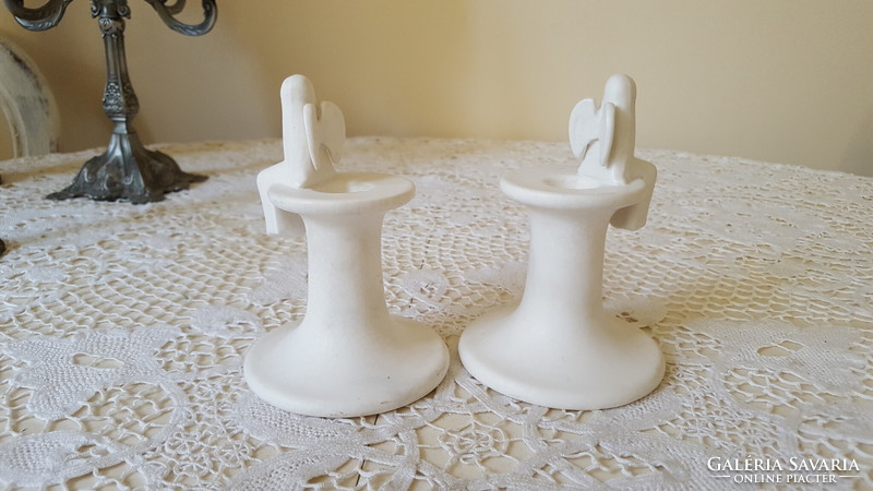 A pair of angelic ceramic candle holders from an old picture gallery