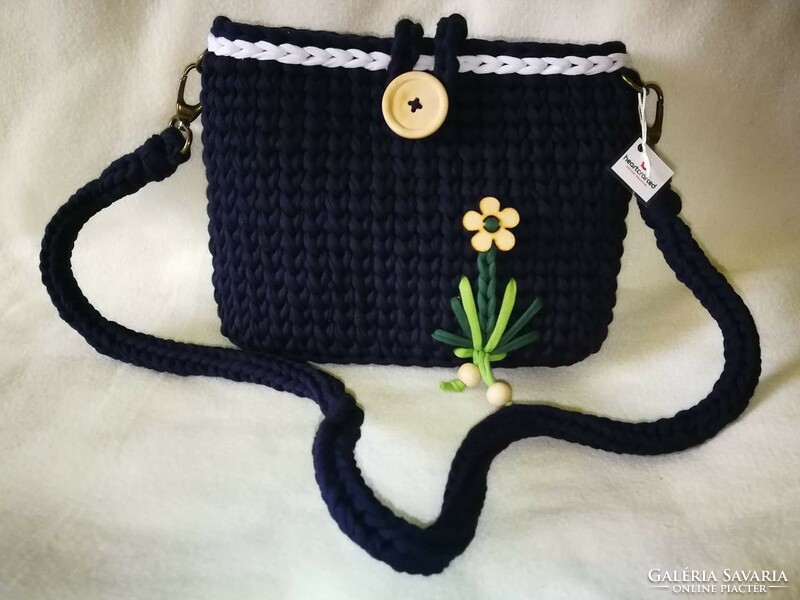 Crochet dark blue shoulder bag with a fun pattern
