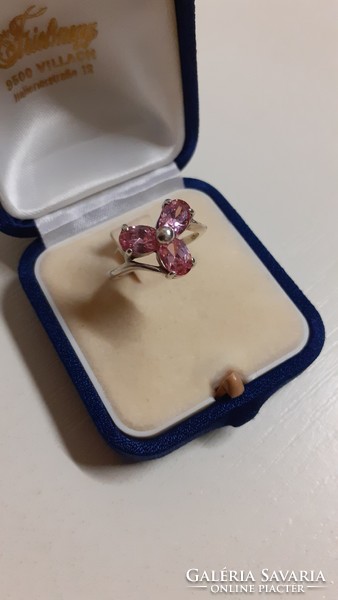 A marked silver ring in good condition, set with a large pink faceted stone