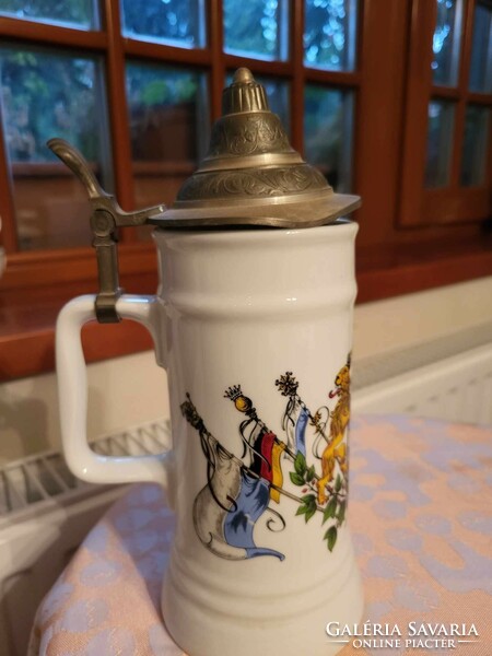 German ceramic beer mug with lid