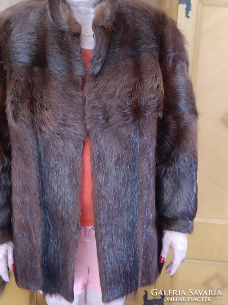 Women's fur coat (size L)