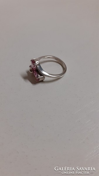 A marked silver ring in good condition, set with a large pink faceted stone