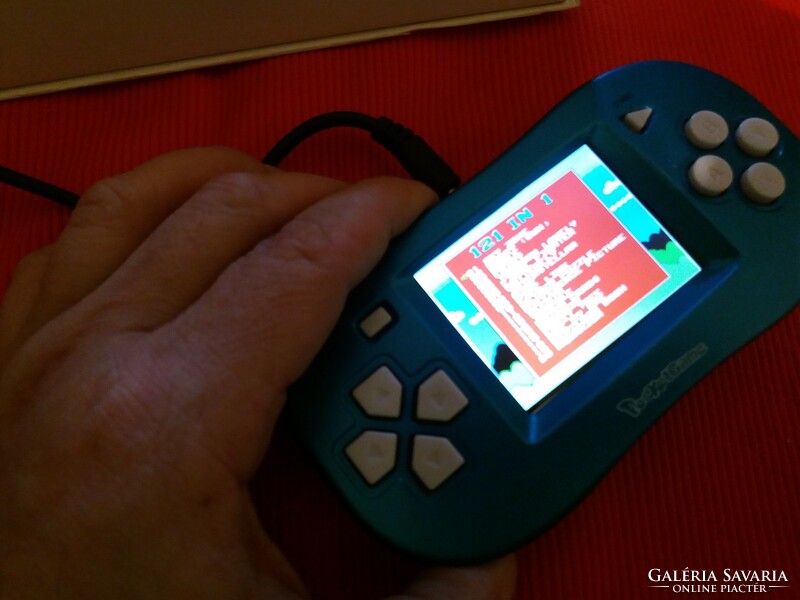Retro handheld video game with 121 built-in games with the option to connect to a TV as shown in the pictures