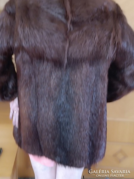 Women's fur coat (size L)