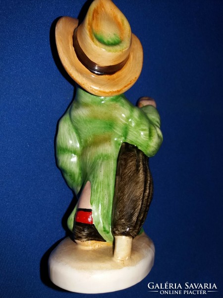 Old Hummel-style picture gallery Hungarian ceramic boy with umbrella in his father's coat, as shown in the pictures