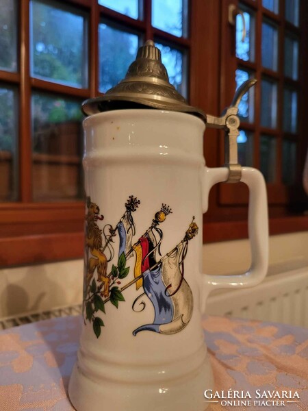 German ceramic beer mug with lid