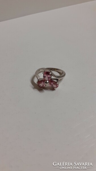 A marked silver ring in good condition, set with a large pink faceted stone