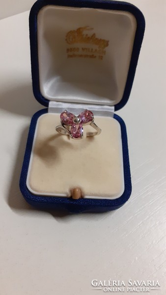 A marked silver ring in good condition, set with a large pink faceted stone