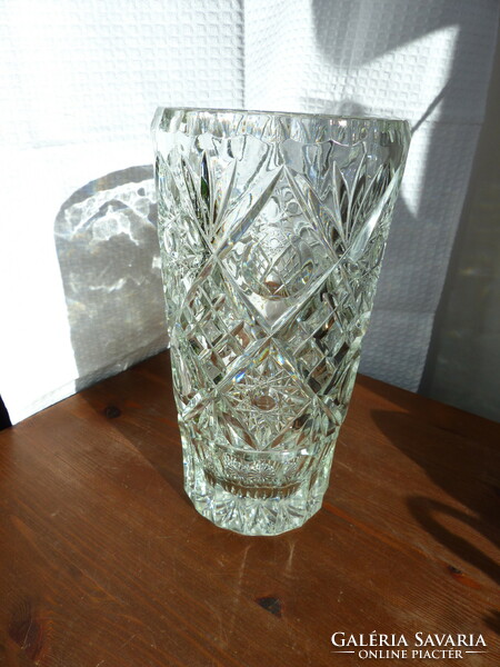 The 23cm beautifully polished lip crystal vase is flawless and brand new