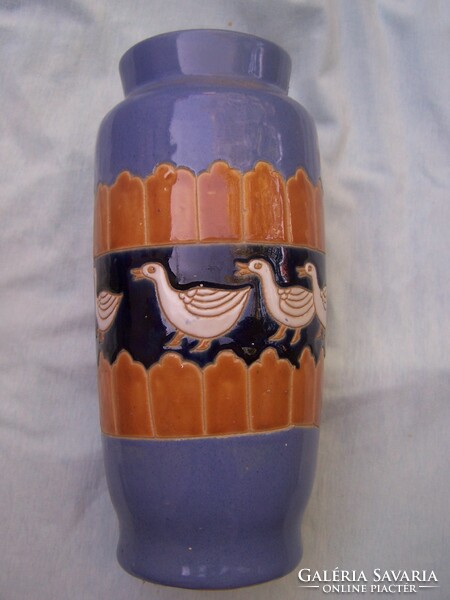 Ceramic vase with a row of geese