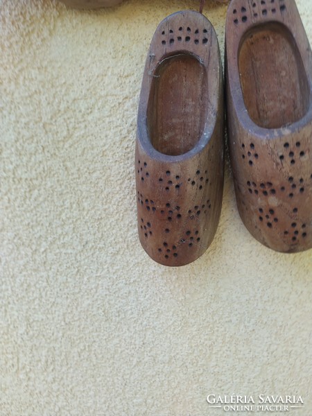 A pair of retro, ornately carved wooden clogs for sale! Wall decoration for sale!