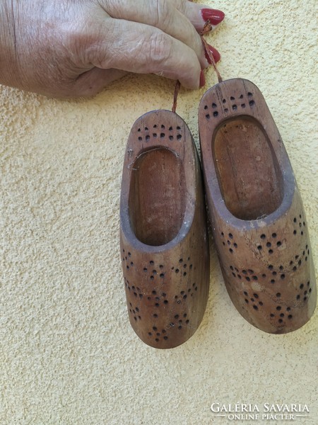 A pair of retro, ornately carved wooden clogs for sale! Wall decoration for sale!