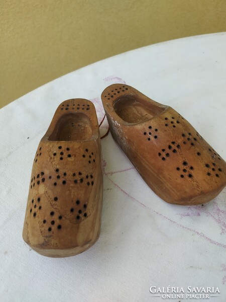 A pair of retro, ornately carved wooden clogs for sale! Wall decoration for sale!