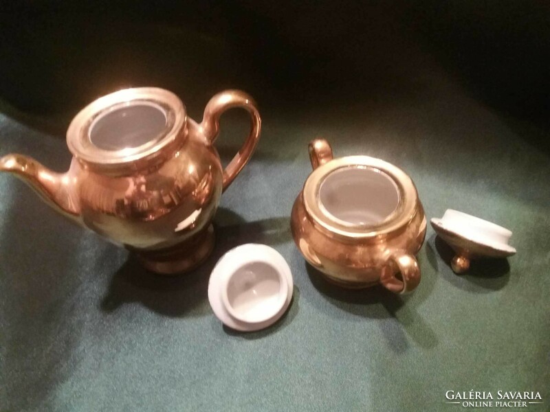 Old, gold-colored, porcelain baby dish, tea set
