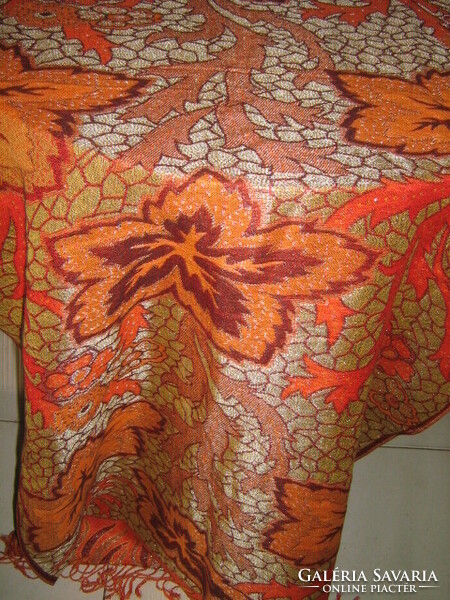 Wonderful fluffy colorful tablecloth with fringed edges