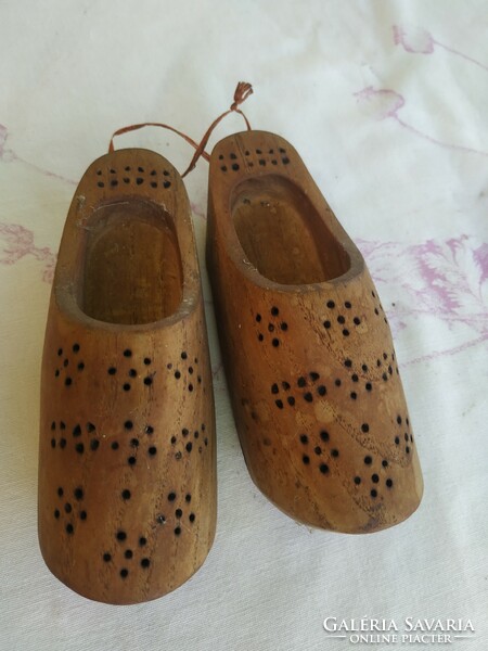 A pair of retro, ornately carved wooden clogs for sale! Wall decoration for sale!