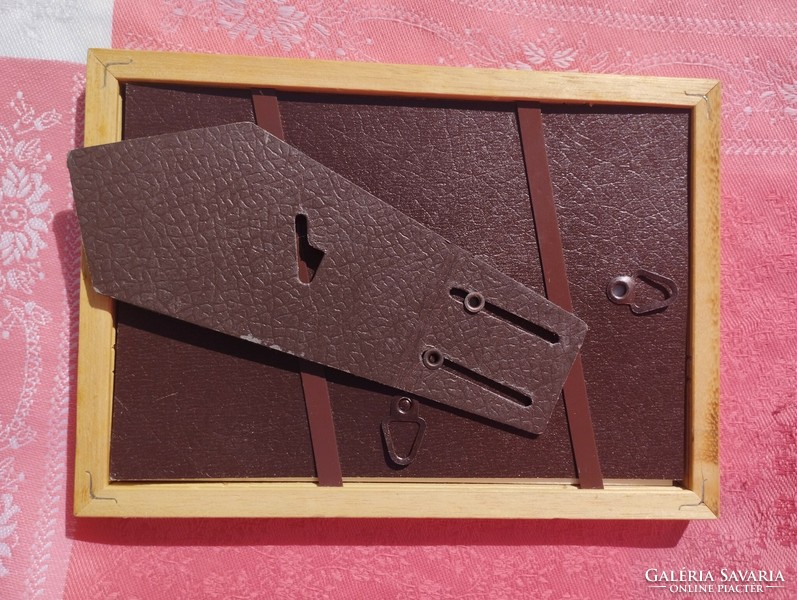 Wooden photo frame with glass plate