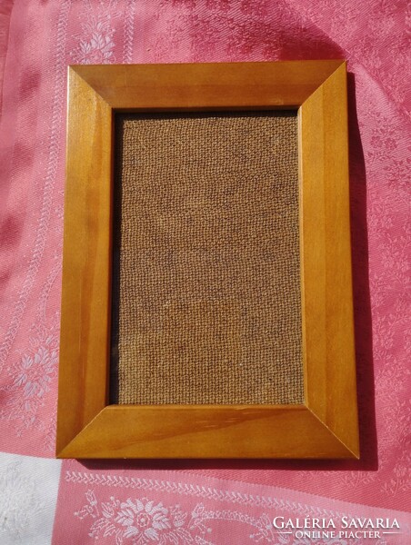 Wooden photo frame with glass plate