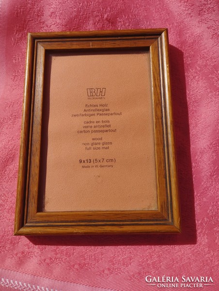 Wooden photo frame with glass plate