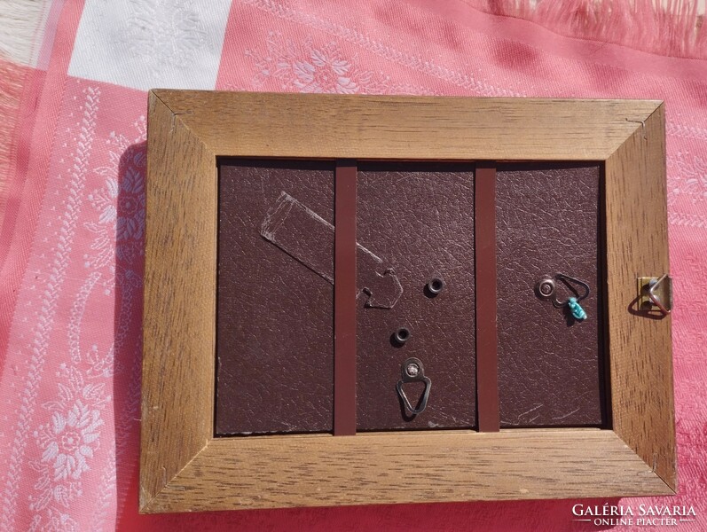 Wooden photo frame with glass plate