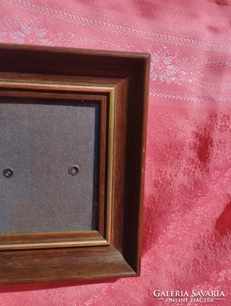 Wooden photo frame with glass plate