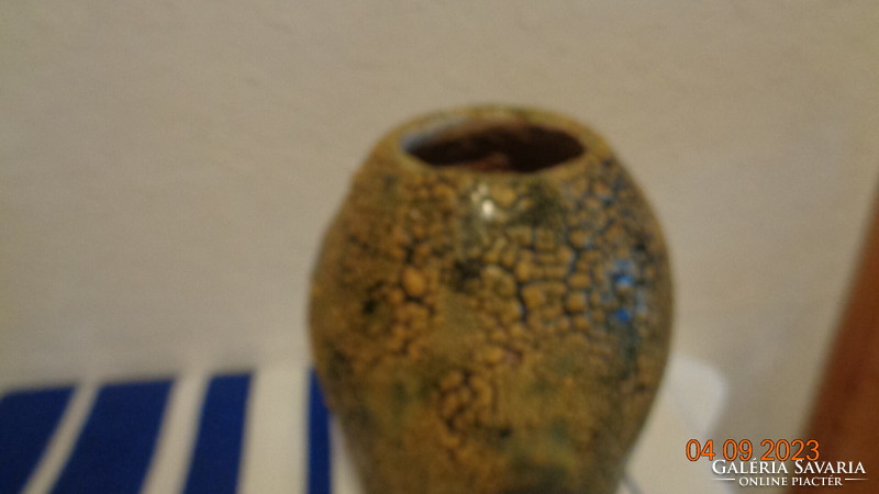 Shrink-glazed ceramic vase marked with a