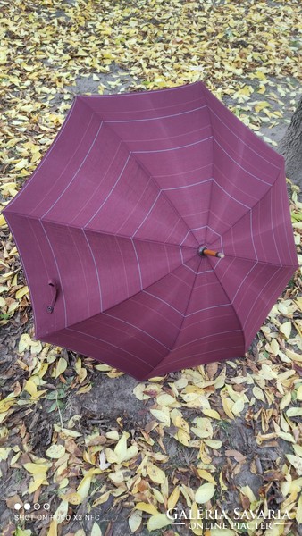 Antique old umbrella marked
