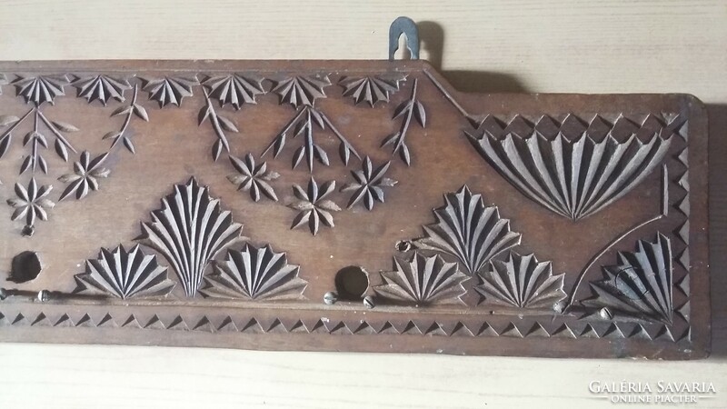 Old carved wooden wall kitchen hanger