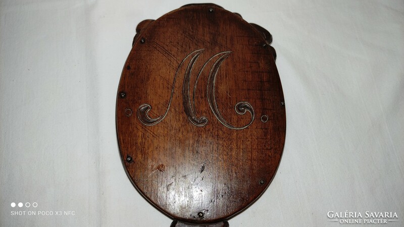 Art Nouveau carved wooden hand mirror with engraved monogram