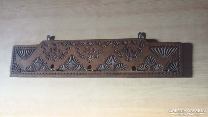Old carved wooden wall kitchen hanger